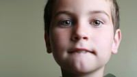 Little Boy Biting Lip