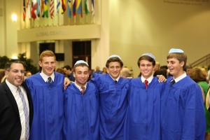 Rabbi Chaim Neiditch and his JSU students at their graduation this year. 