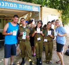   Rachel (far right) counts off for attendance with OU Israel Free Spirit  participants using letters of the Hebrew alphabet. 