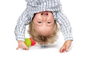 kid hanging upside down