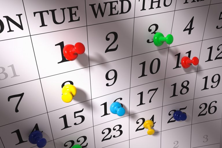 Calendar with pushpins