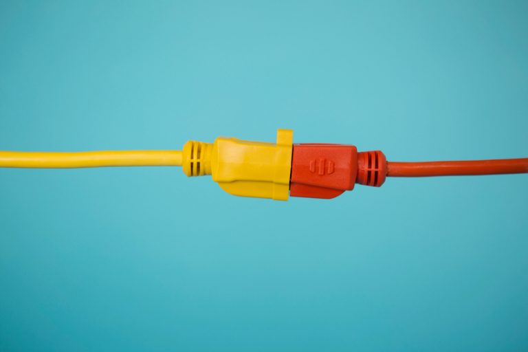 Red and Yellow electrical plug connected