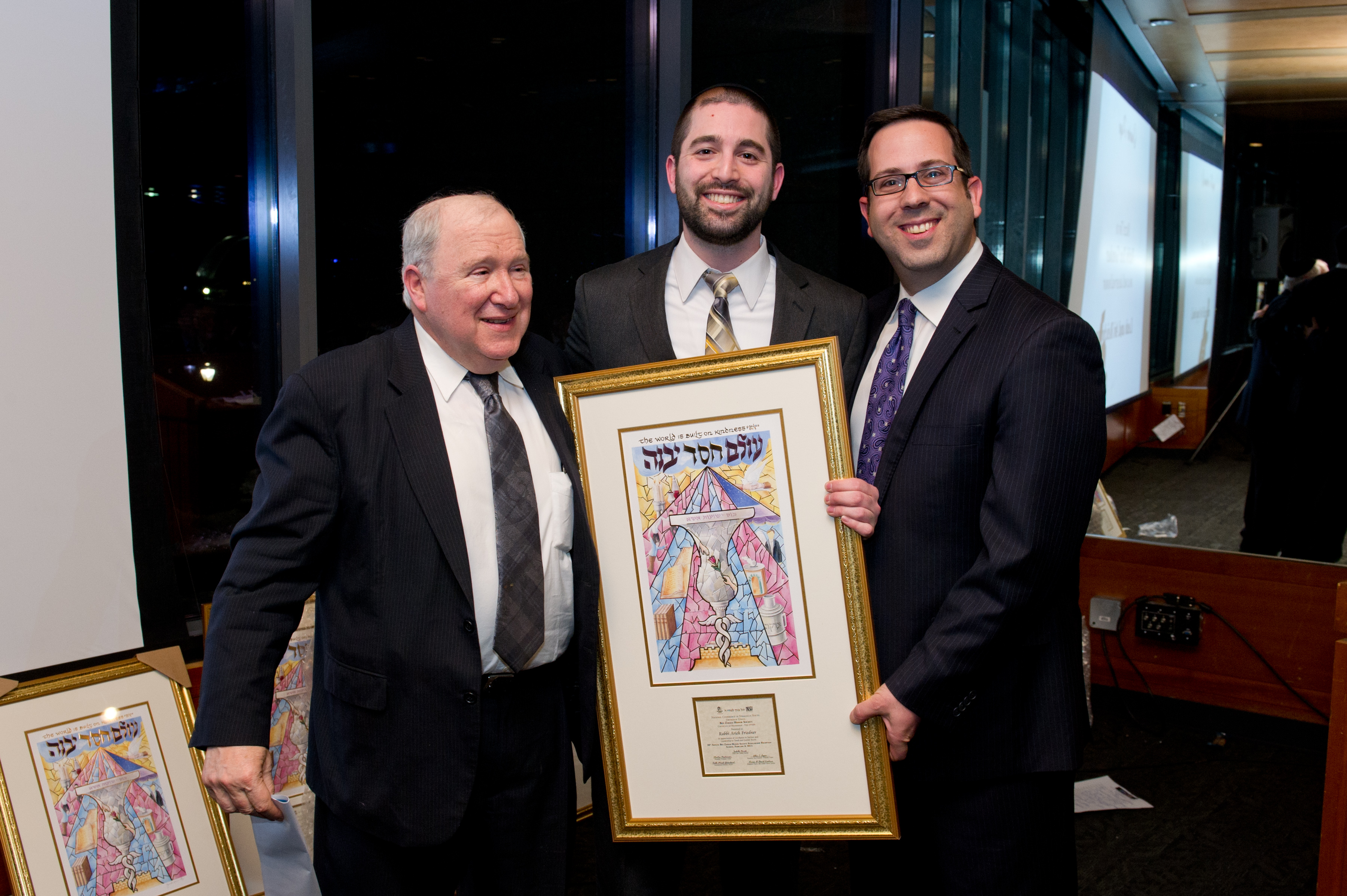 Rabbi Arieh Friedner of Cleveland NCSY was one of the night's inductees into the Ben Zakkai Honor Society. From left to right: Dinner Chair Dr. David Luchins, Rabbi Arieh Friedner, and Rabbi Micah Greenland, NCSY's International Director. 