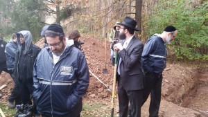 Rabbi Meir Weill and Rabbi Yanky Meyer of Misaskim and Rabbi Mendy Carlebach of Chabad of Rutgers as they get ready to bury the Torah Scrolls