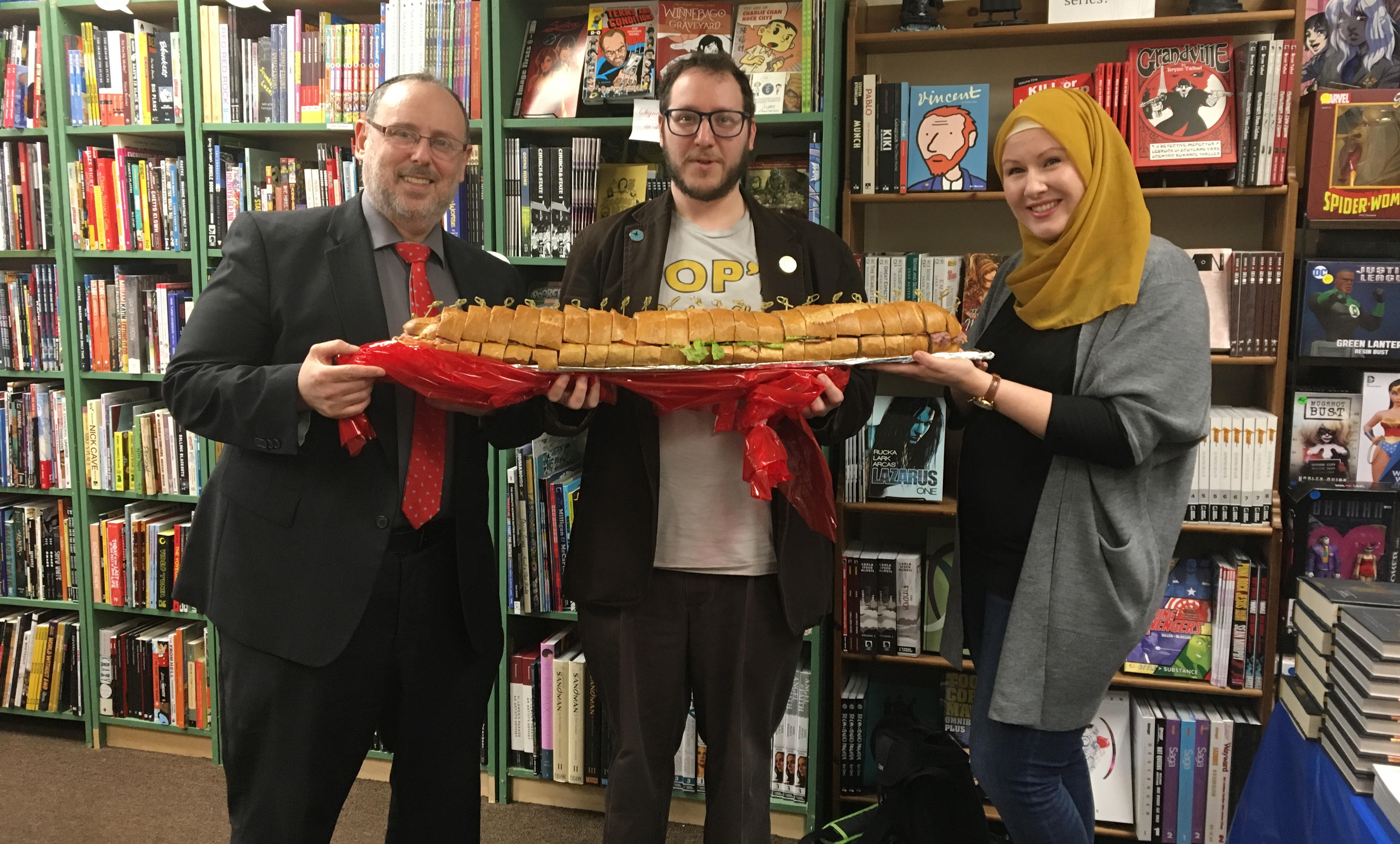 A Jew and a Muslim Walk Into a Comic Book Shop. The Proprietor Hands Them a Sandwich.