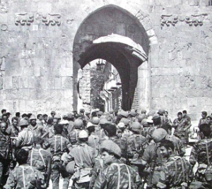 Soldiers approach the Old City walls in 1967